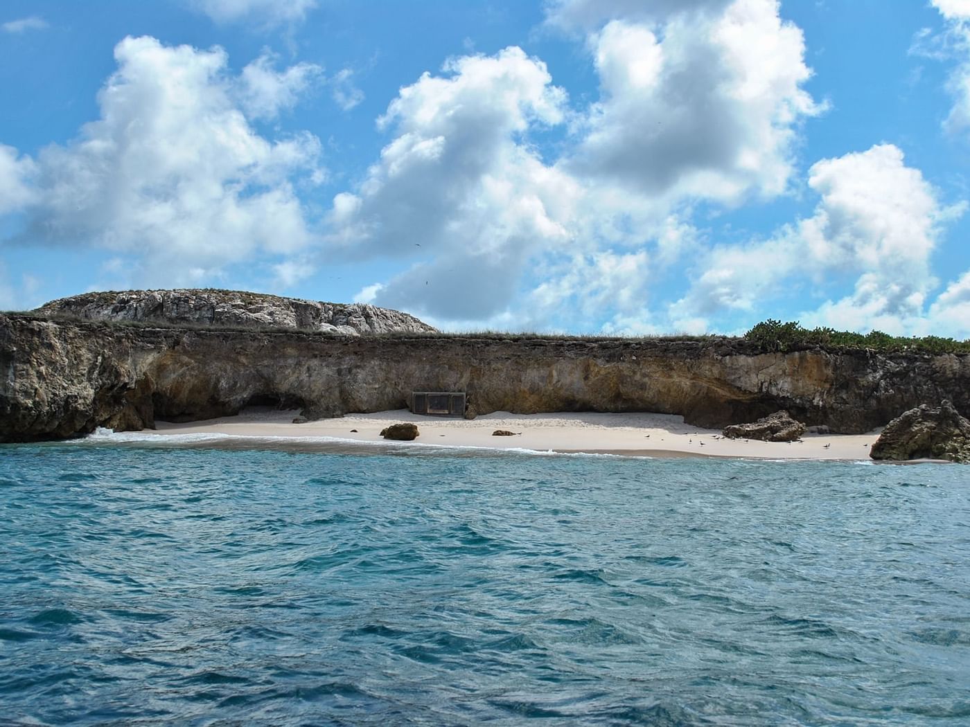 View of a Marieta Island from sea near La Colección Resorts