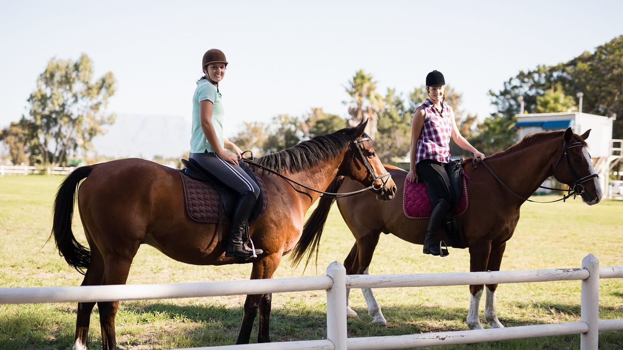 friends horseback riding