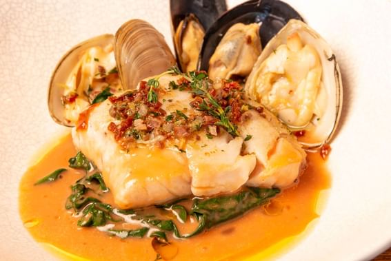Mussels and king crab dish served in Gusto Da Giannis at Alcyone Hotel Residences