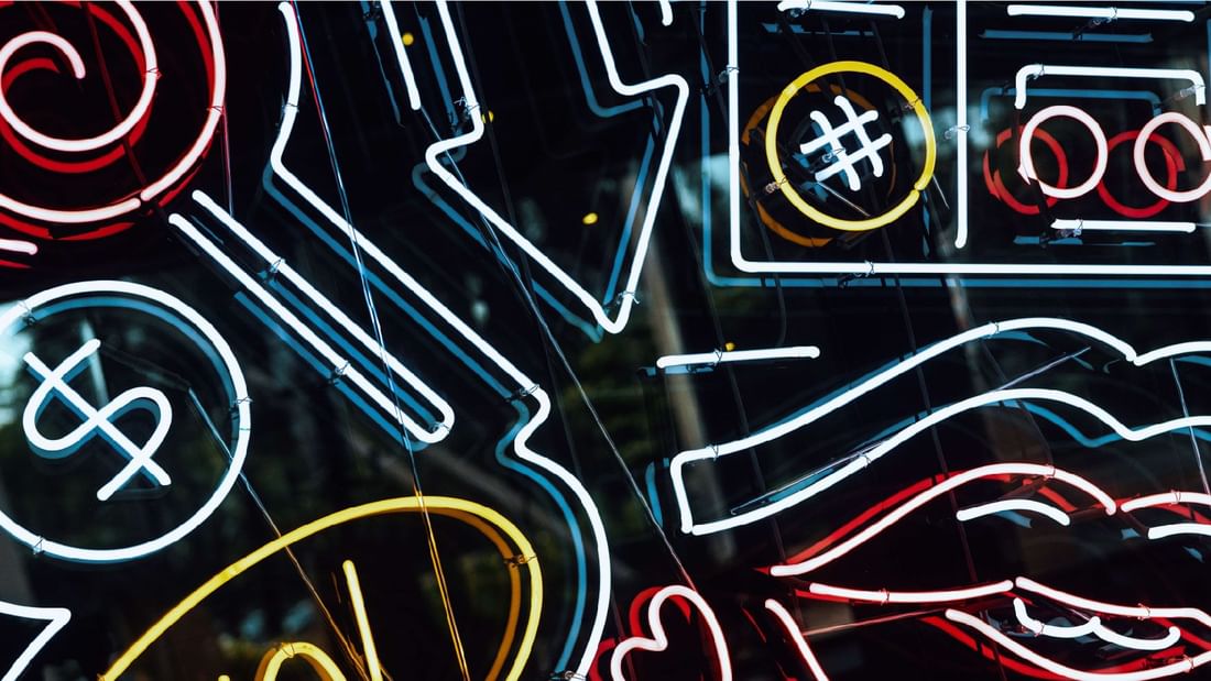 A close-up of vibrant neon signs, showcasing the lively atmosphere at a venue within Sunway Hotel Pyramid