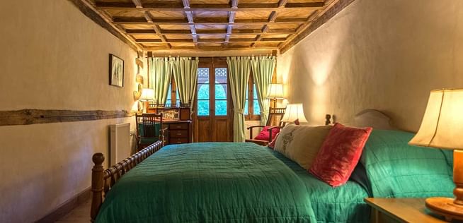 Interior of the bedroom in Royal Suite at Serena Khaplu Palace