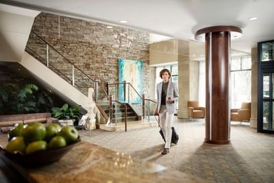 A lady in the hotel lobby at Metterra Hotel on Whyte