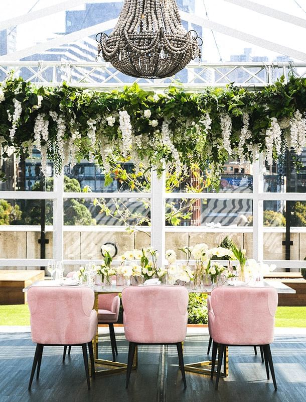 Crown Aviary weddings with pink chairs at Crown Hotel Melbourne
