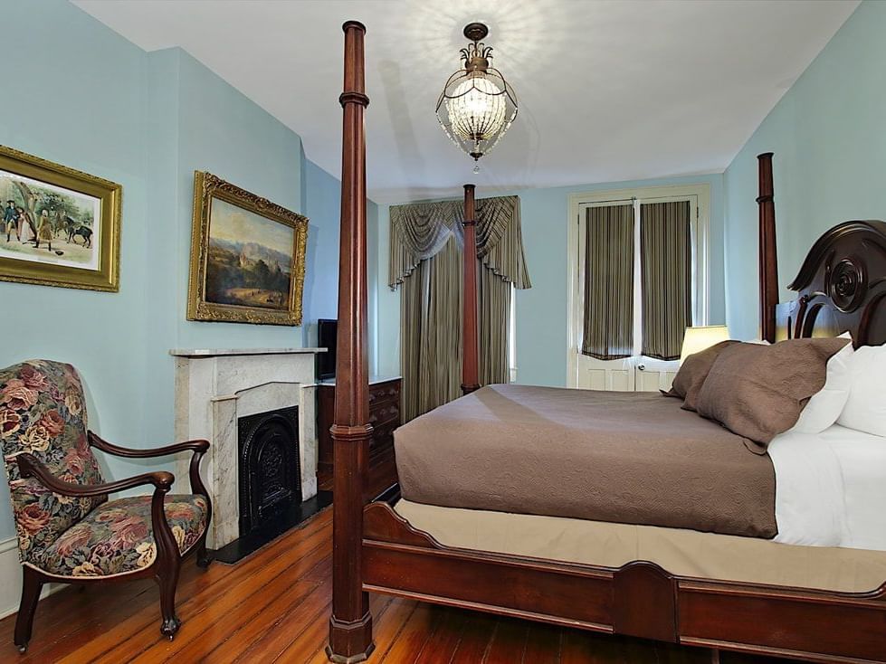 Bed in Antique Suite Lamothe at French Quarter Guesthouses