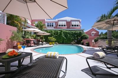 pool with lounge chairs