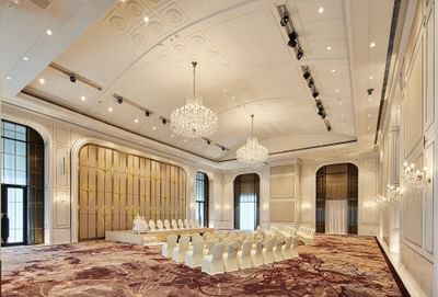 Chairs arranged with carpeted floors for a Meeting at Eastin Hotels