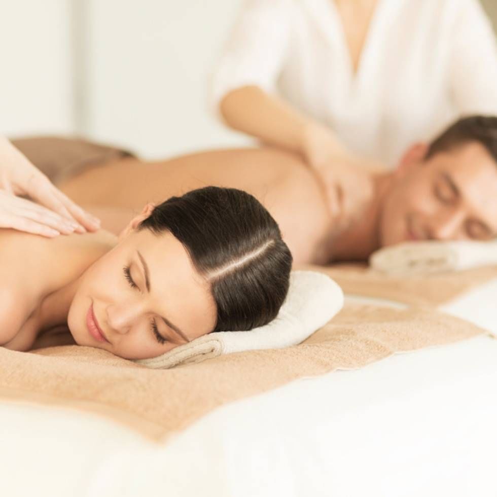 The couple having a romantic massage at Falkensteiner Hotels