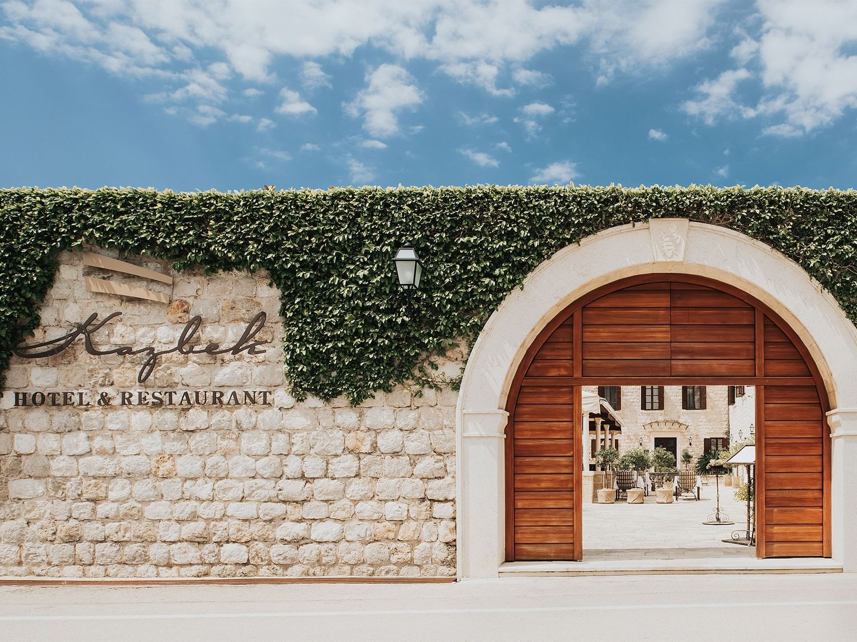 Entrance to Hotel Kazbek with the logo