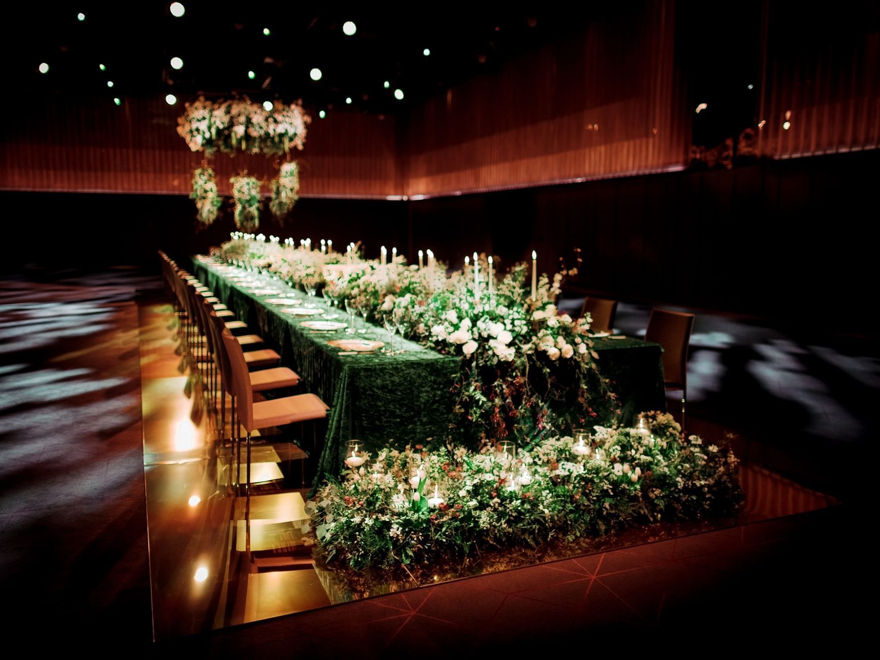 Dining table setup for a reception held at The Londoner Hotel