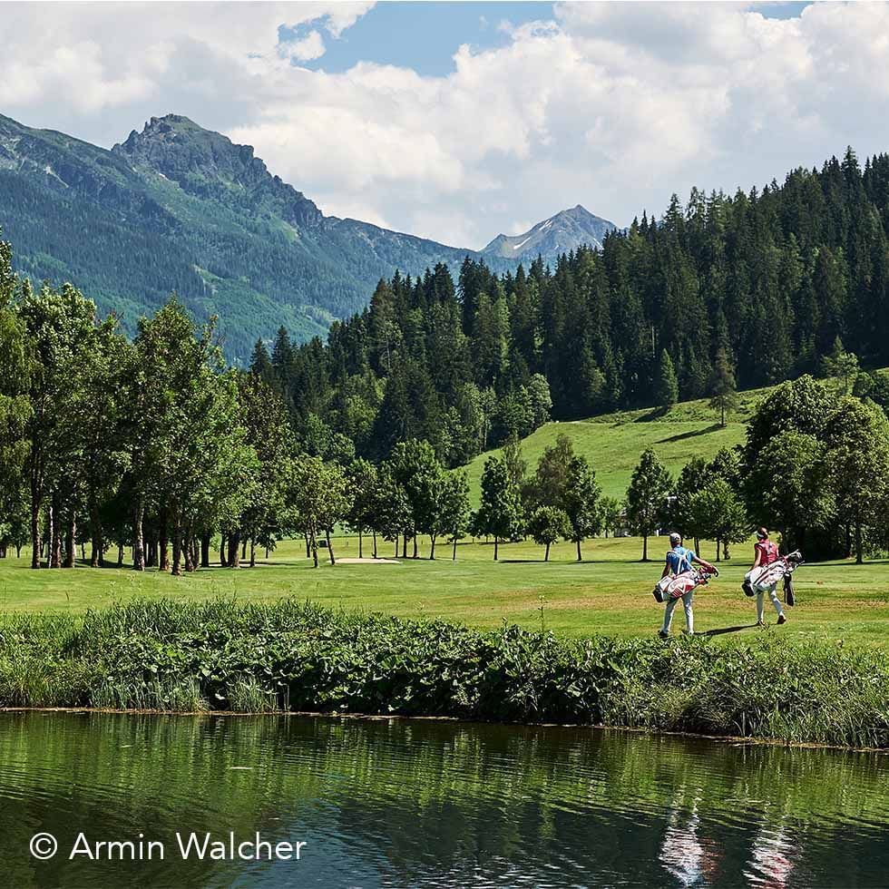 Two players at Golf Course near Falkensteiner Hotel Schladming