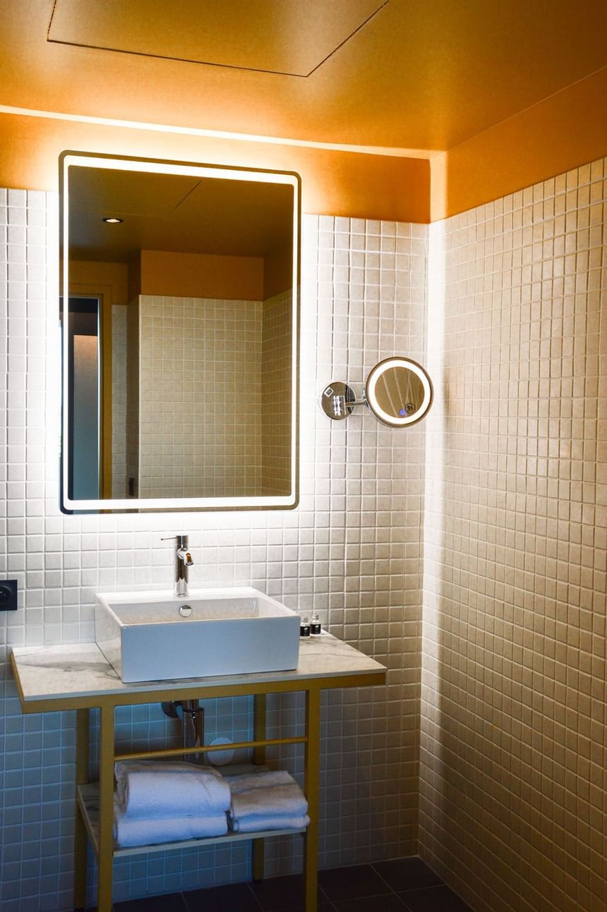 Bathroom vanity of studio bedroom at Kopster Hotel