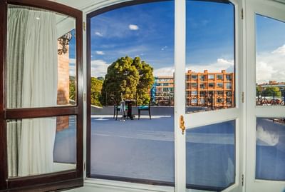 City with skyline view from Terrace Suite at Le Manoir Bogotá Hotel