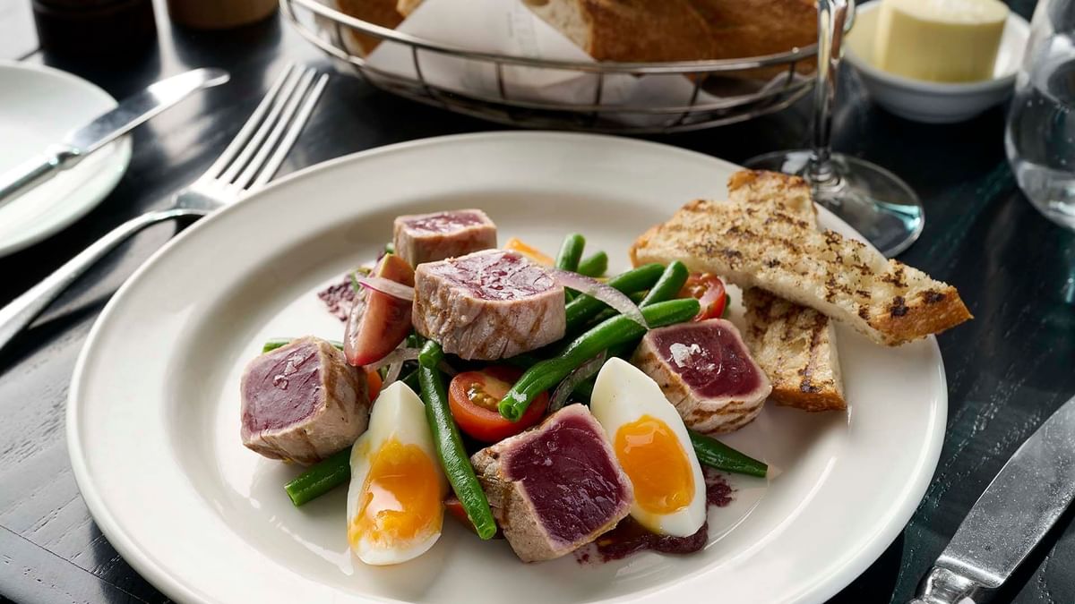 Salad with tuna, vegetables and eggs served in Bistro Guillaume Restaurant at Crown Hotel Melbourne
