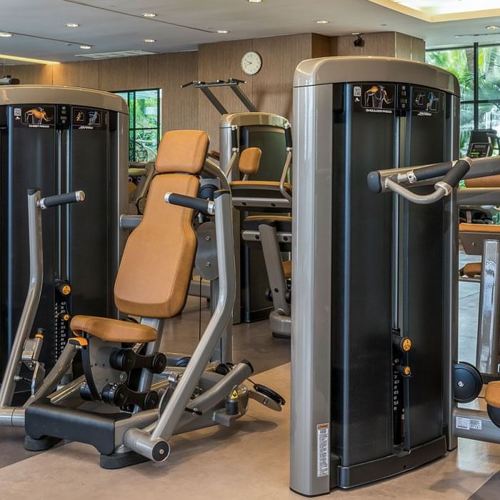 Interior of the fitness center at Chatrium Residence Sathon