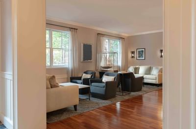 Lobby lounge area with cozy sofas & wooden floors at Portland Harbor Hotel