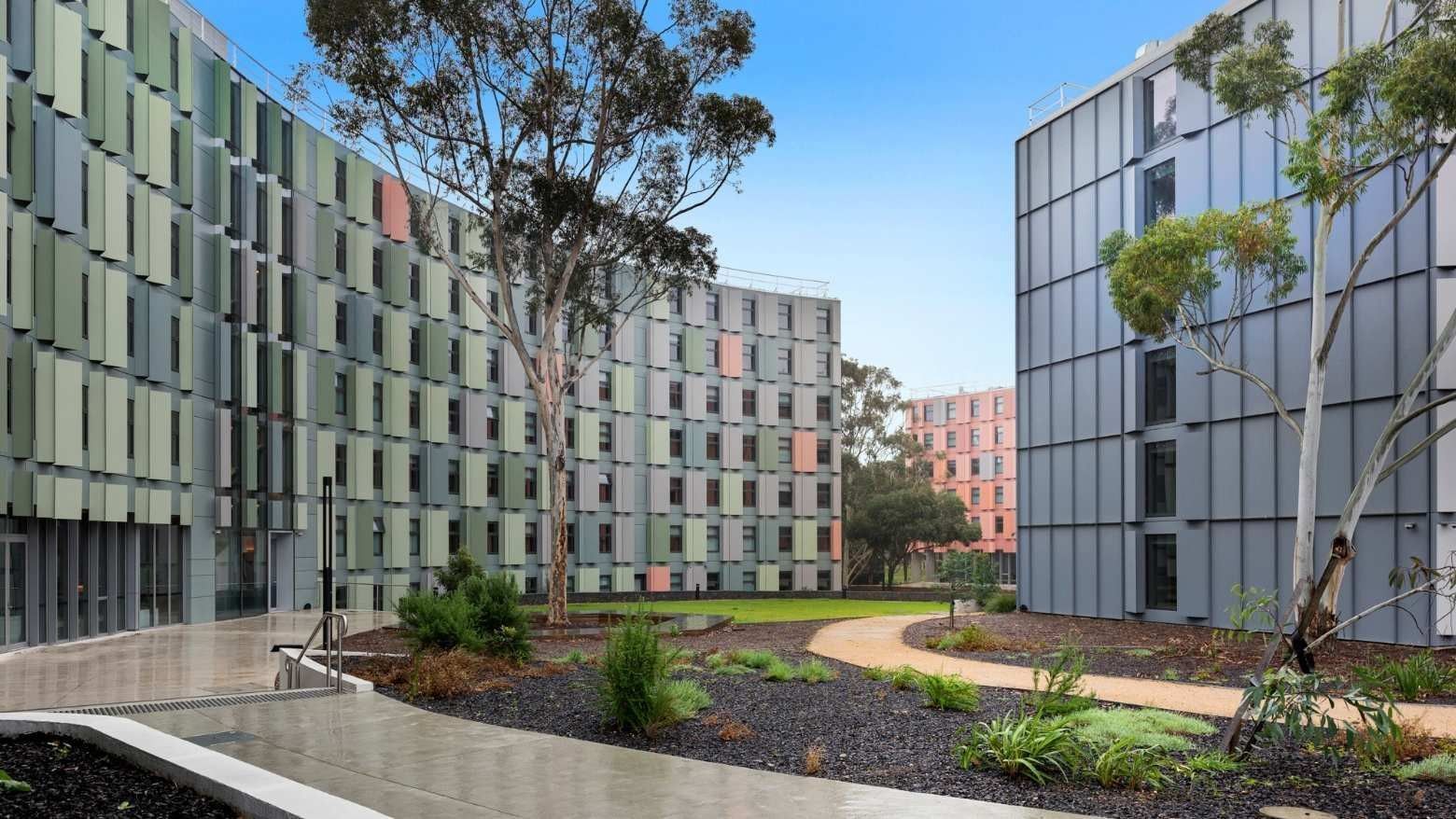 Modern architecture and lush greenery at La Trobe University - North and South Apartments.