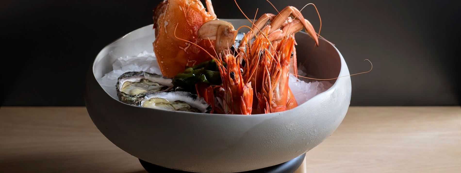 Close-up of a seafood dish in Woodcut at Crown Towers Sydney