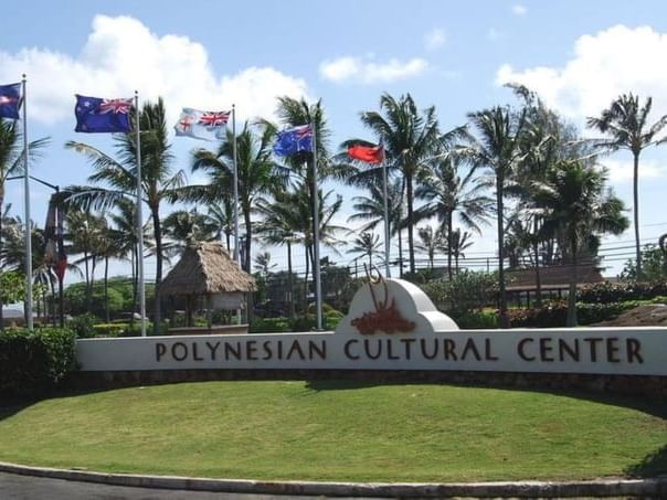 Polynesian Cultural Center sign board by the entrance near Paradise Bay Resort