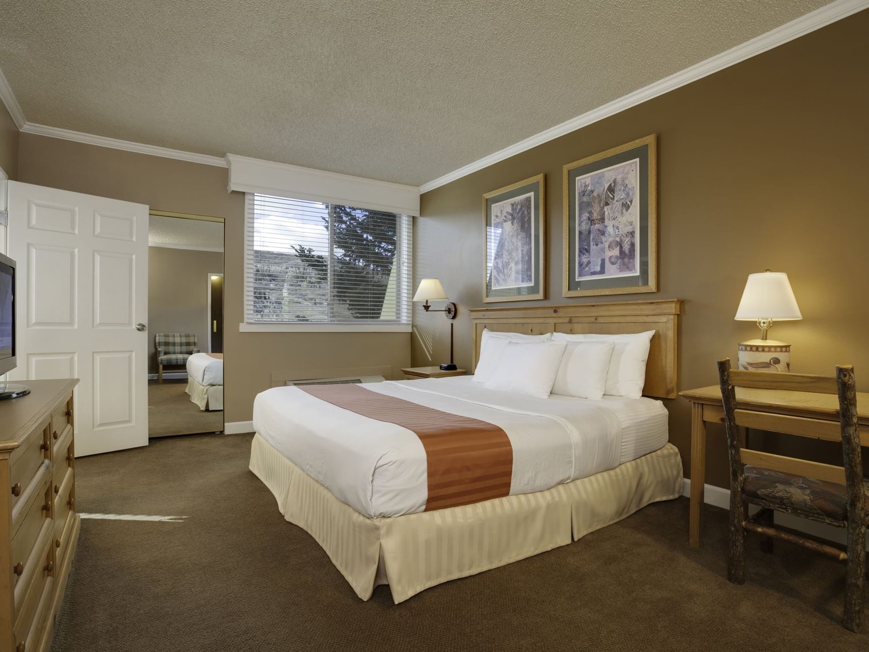 Large bed, Two bedroom suite at Legacy Vacation Resorts