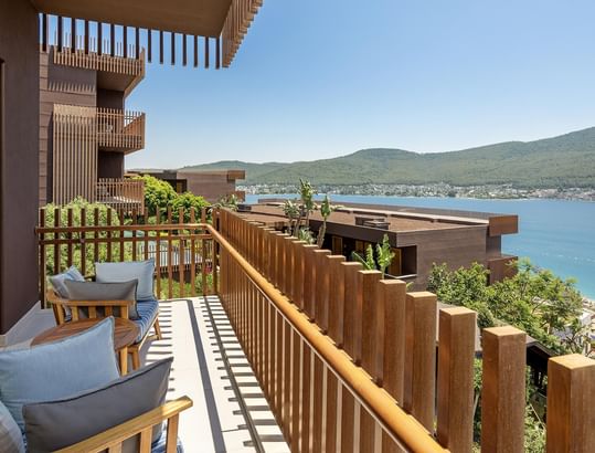 Sea view from the Superior Room's Balcony equipped with cozy chairs at Titanic Luxury Collection Bodrum