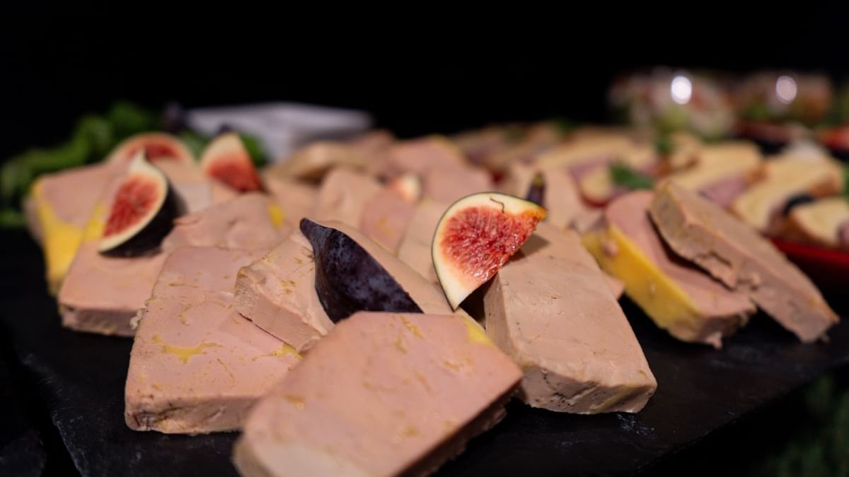 Platter of foie gras with fig slices on a slate serving board in Restaurant Le W at Warwick Paris Champs Elysées