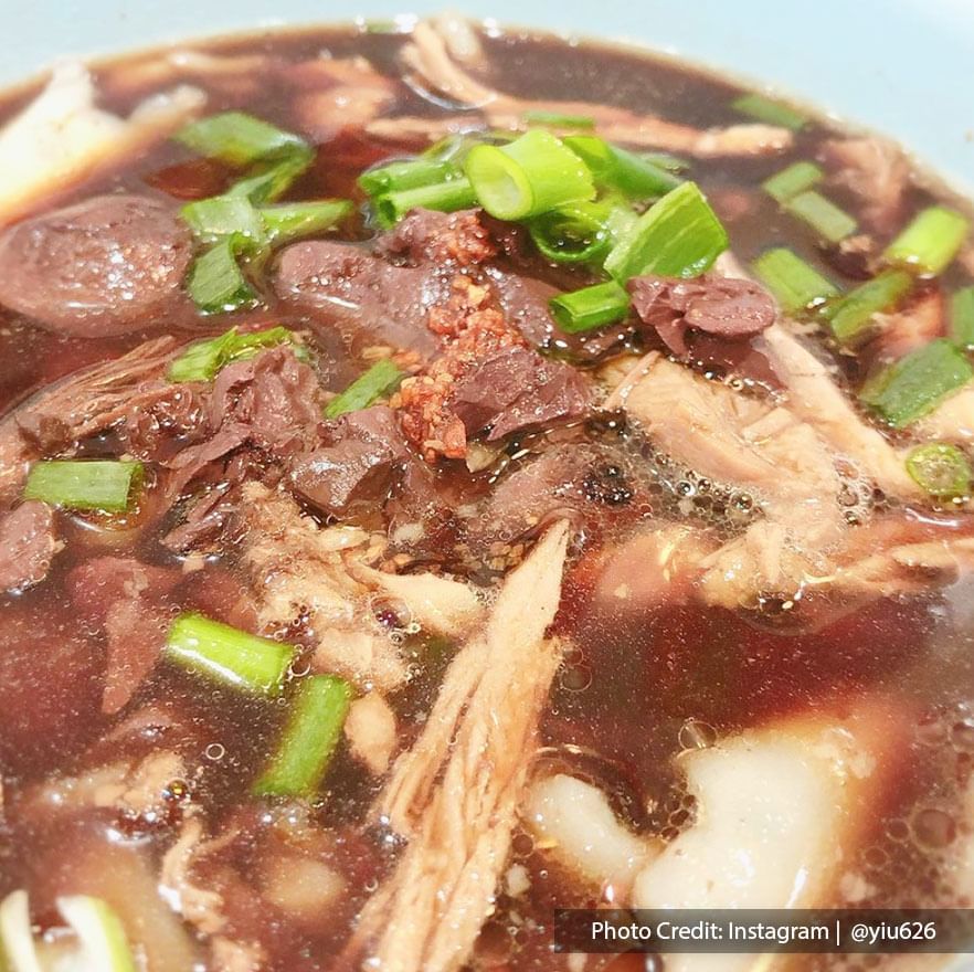 a zoom-in photo of a duck kway chap Penang street food