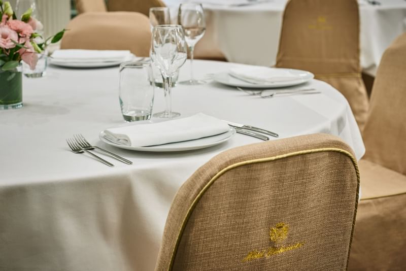 Close-up of well-arranged table set up in Récamier at Hôtel Westminster - Paris