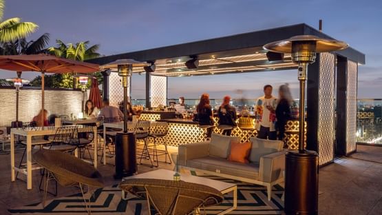 Guests enjoying I|O Rooftop at The Godfrey Hotel Hollywood
