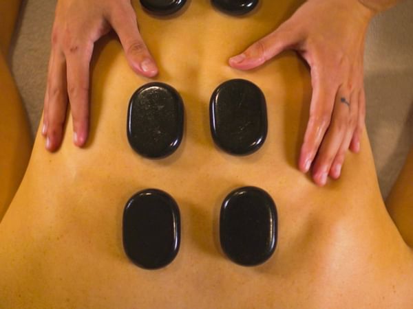 Woman getting massage with stones at Safety Harbor & Resort
