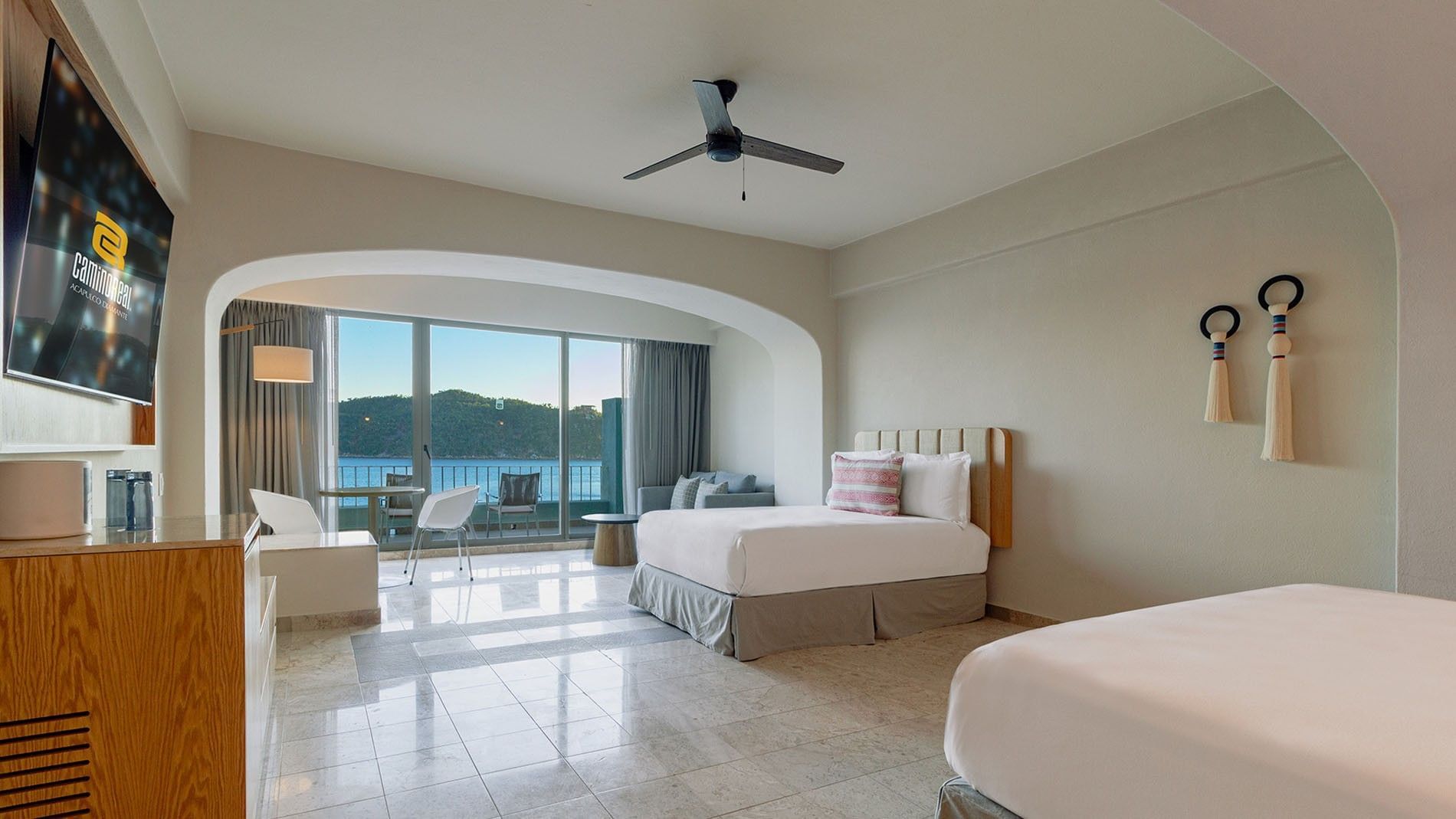 Balcony with a Puerto Marqués Bay view in Extra King Bed & Double Bed Deluxe Superior Room at Camino Real Acapulco Diamante