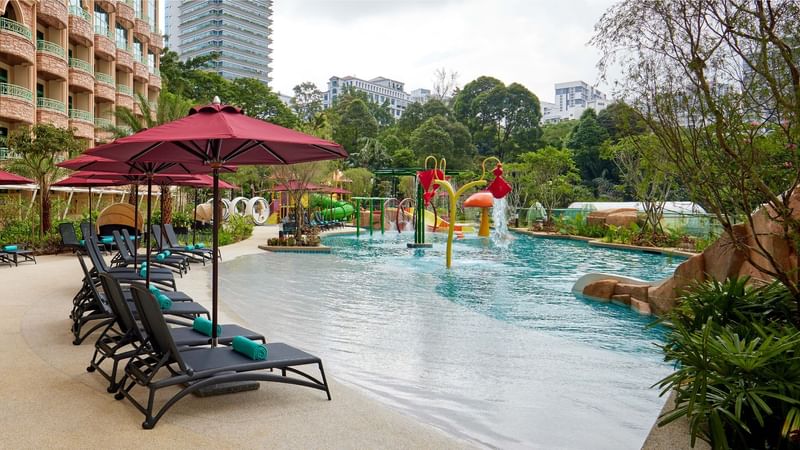Loungers, slides & umbrellas in Water-venture at Sunway Resort