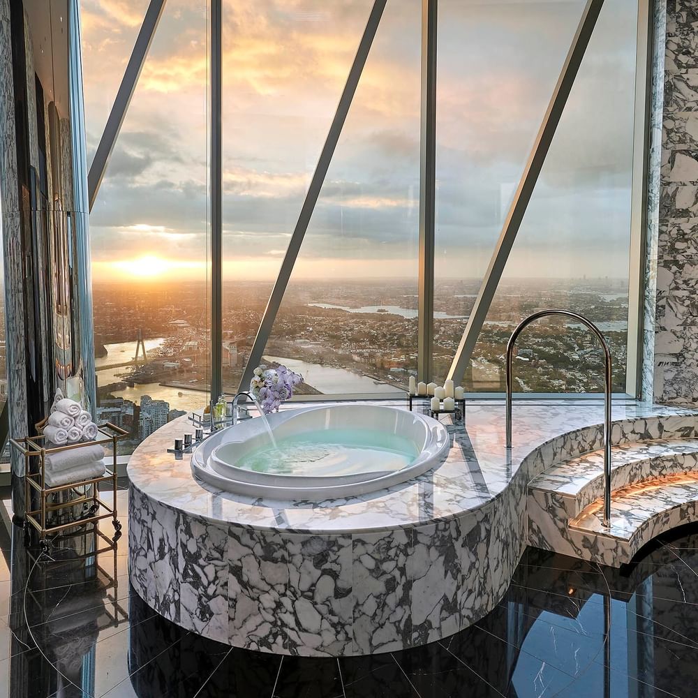 Luxury marbled bathtub overlooking the city & river at Crown Hotels