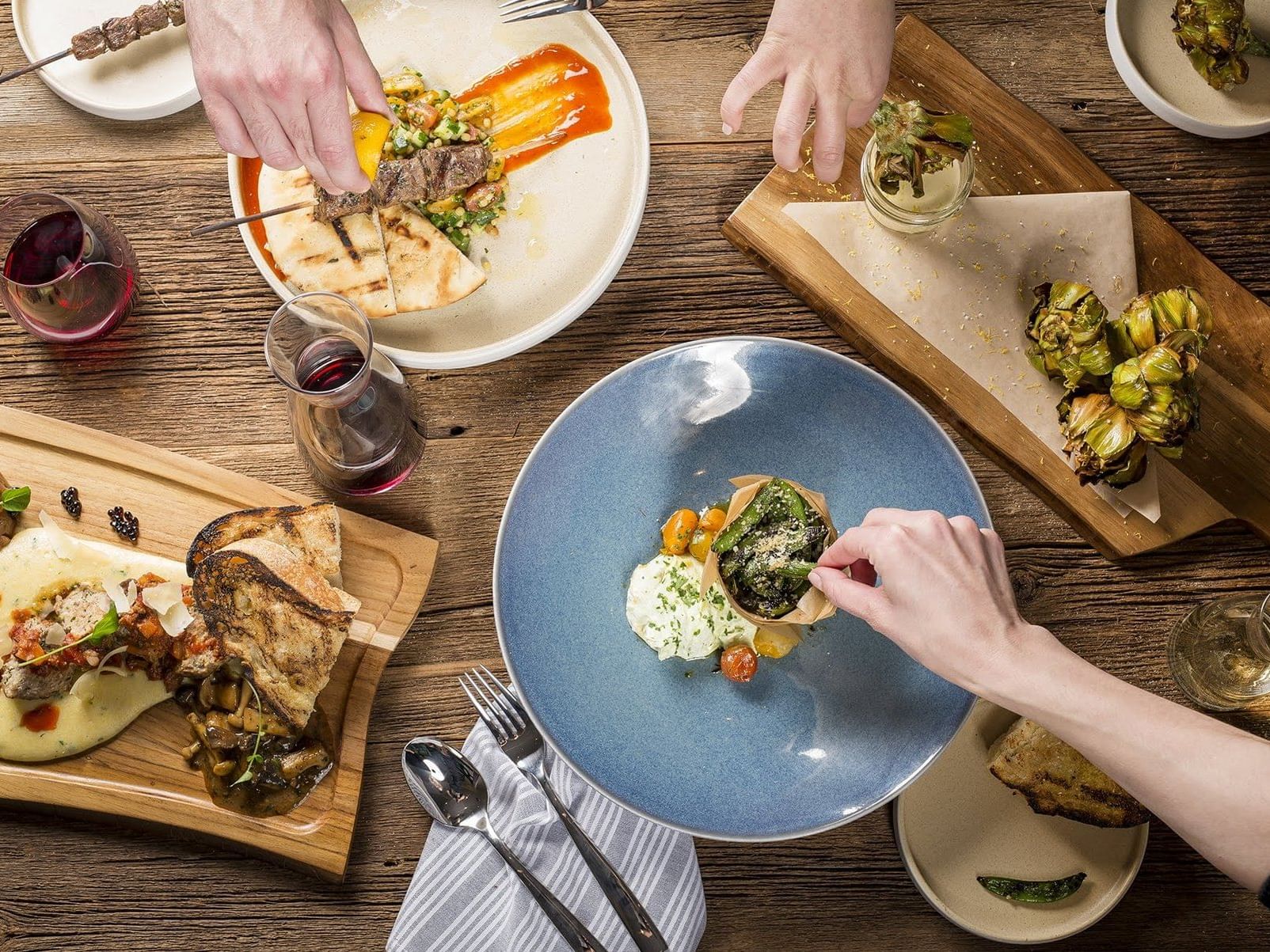 two people share delicious appetizers