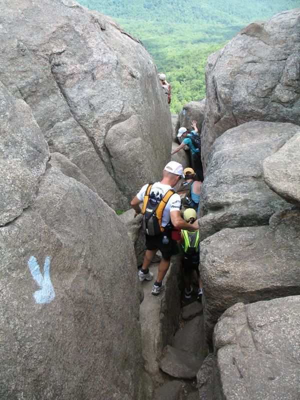 Group of people hiking rock near Inn at Willow Grove