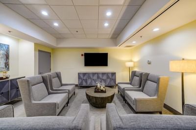 Lounge area & boardroom set-up in Executive Boardroom One at St. Louis Airport Hotel