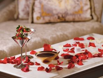 Dessert served on decorated coffee table at Palazzo Versace