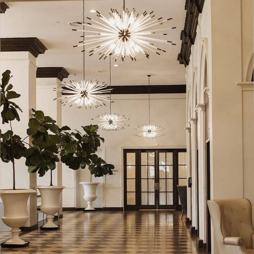 classic chandeliers and checkered floors of palm court
