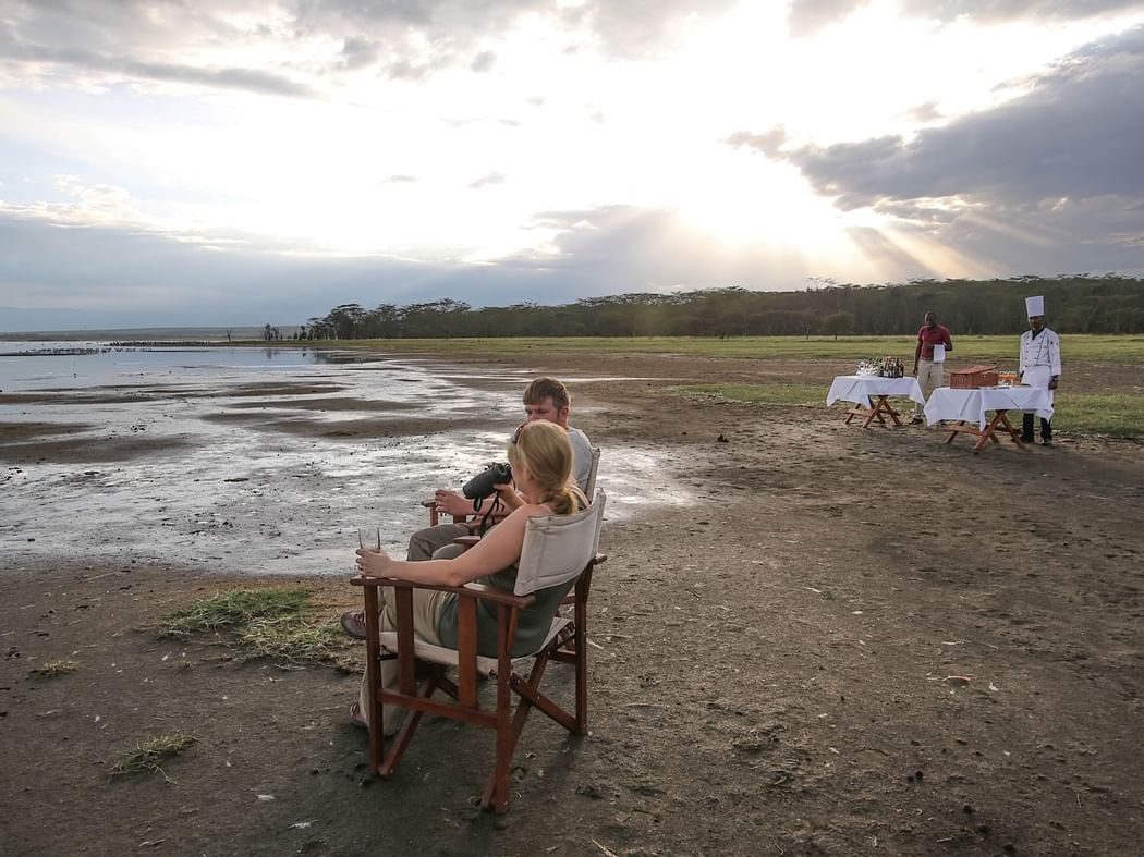 Guests having breakfast by the lake at Hotel Lake Elmenteita