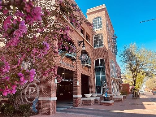 Old Town parking garage with spring flowers next to Hotel at Old Town