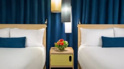 two beds in a hotel room