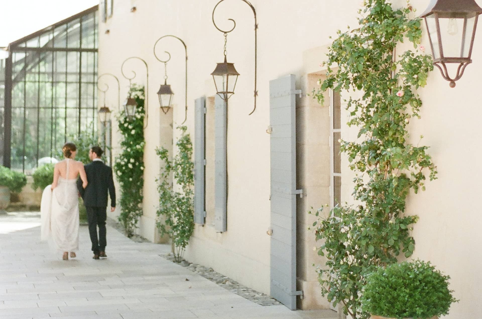 Wedding couple walking together at Domaine de Manville