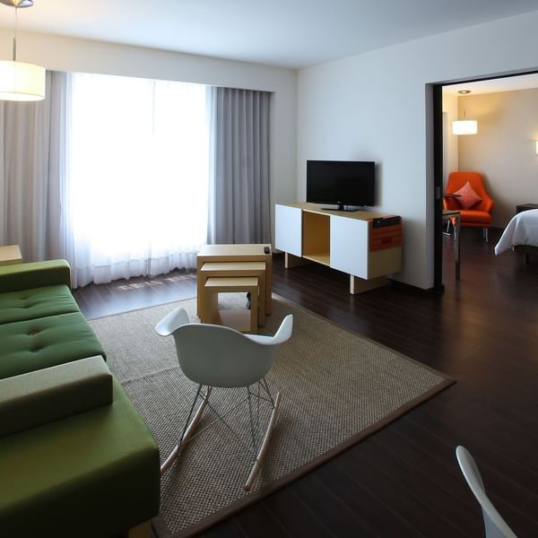 Interior of Junior Suite with Tv & loungers at Fiesta Inn