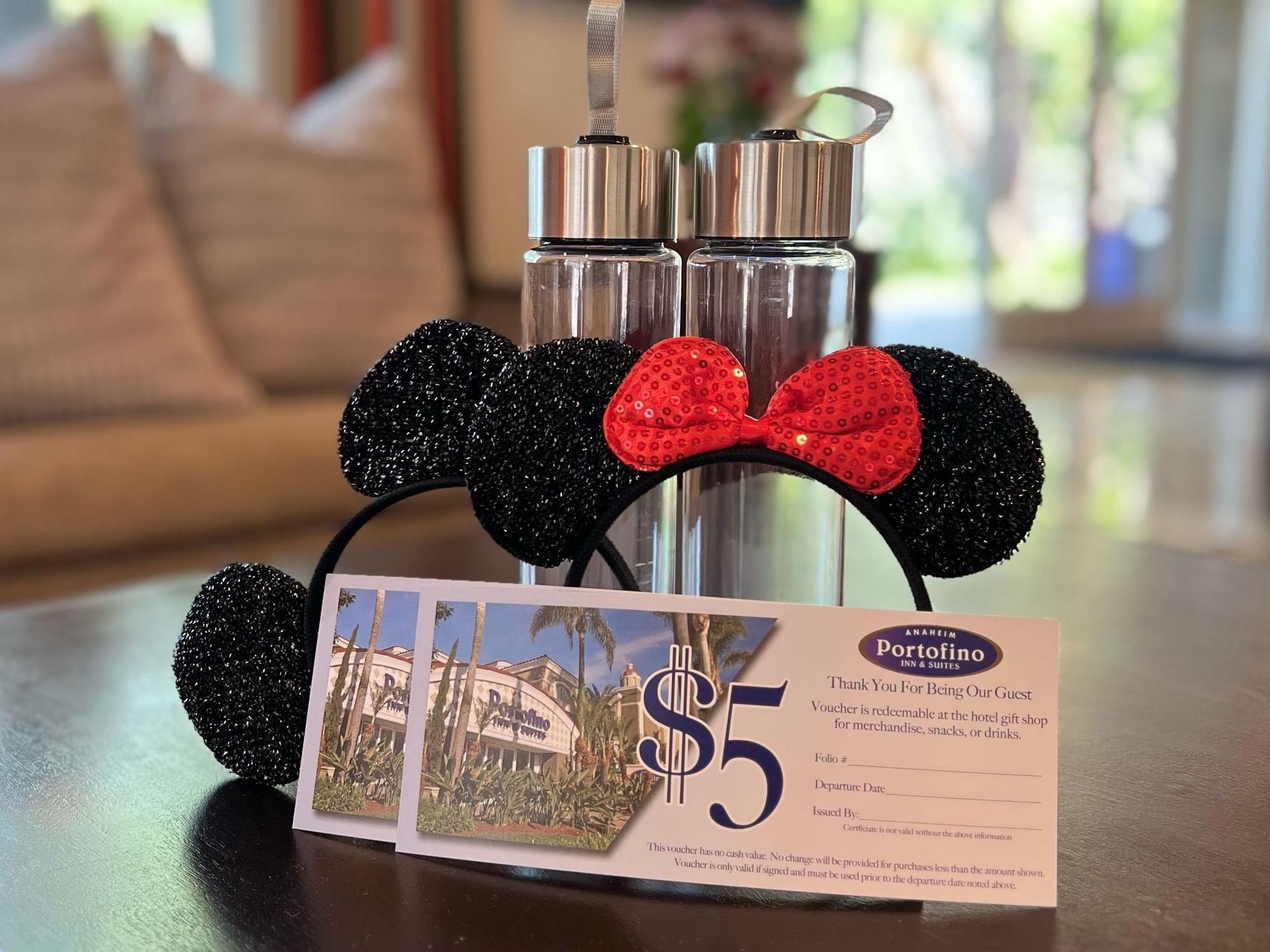 Close-up of Mickey & Mini mouse ears & gift vouchers at Anaheim Portofino Inn & Suites