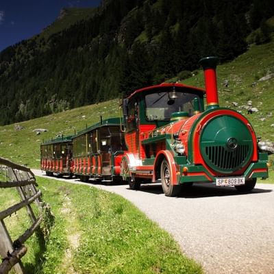 Tourist train in Poellatal Reserve near Falkensteiner Hotels