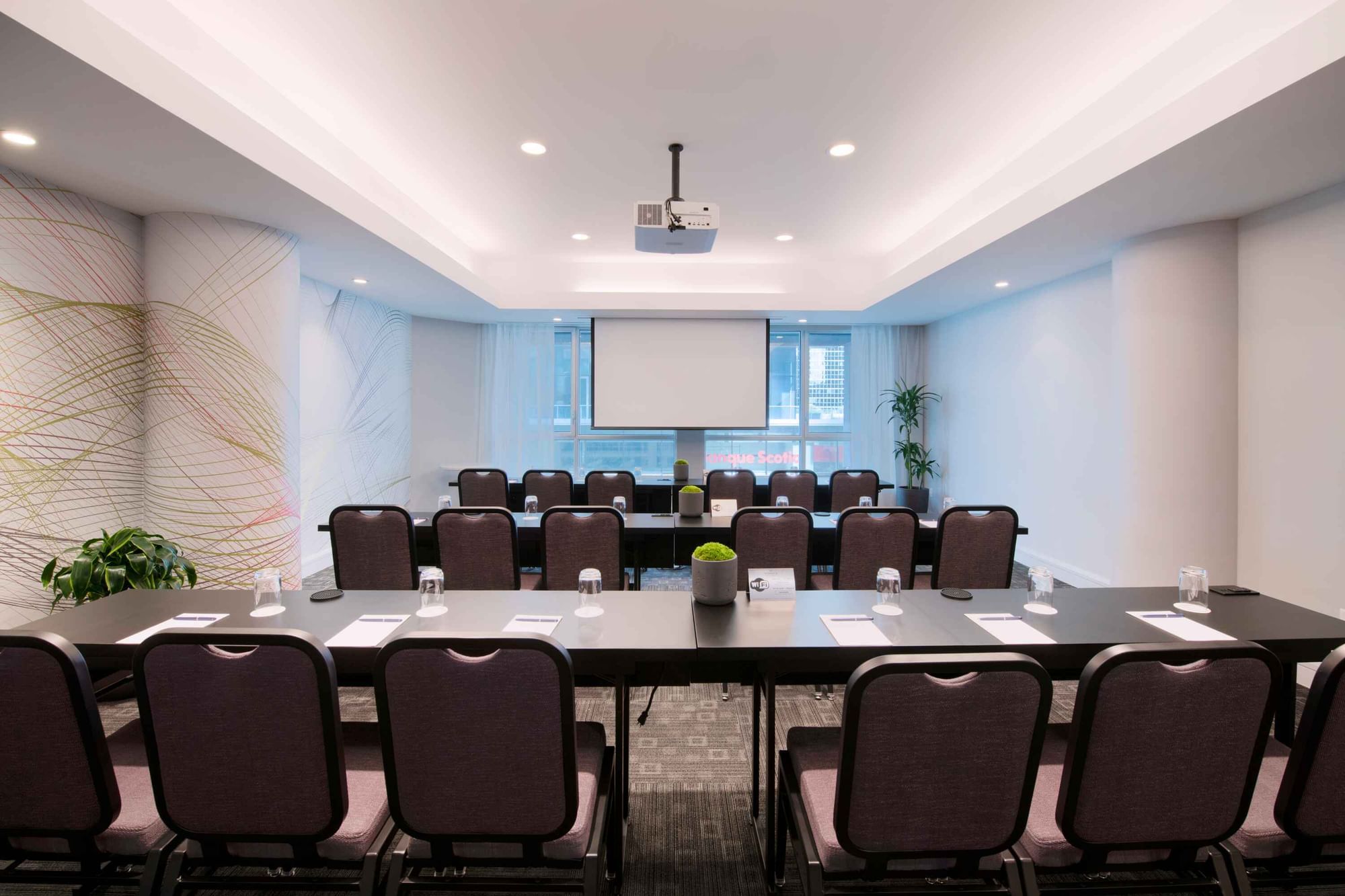 Classroom set-up with carpeted floors in Salon Drummond at Warwick Hotels and Resorts