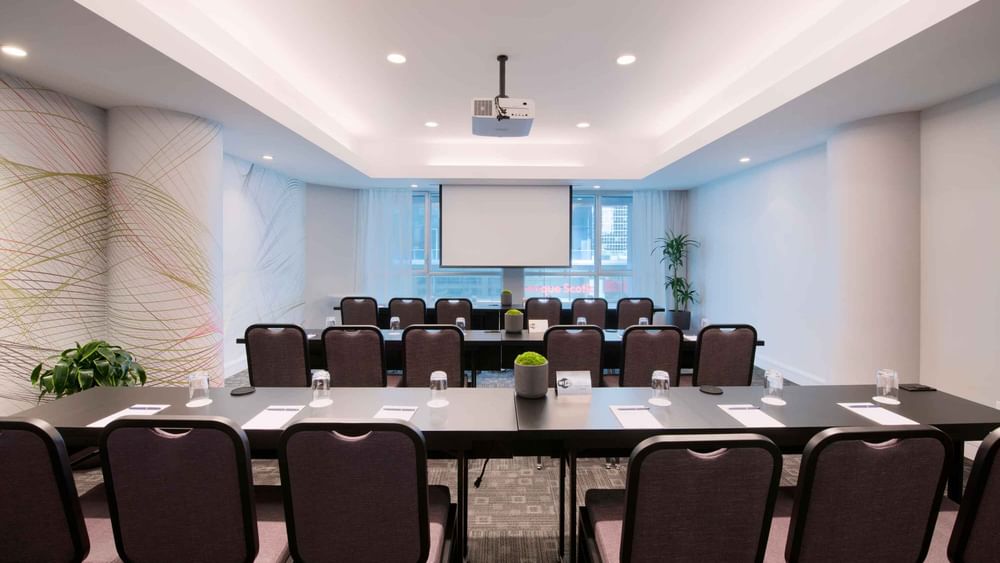 Classroom set-up with carpeted floors in Salon Drummond at Warwick Le Crystal Montreal