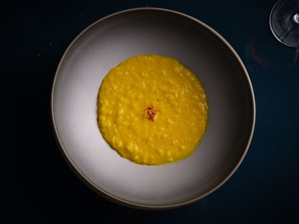 Close-up of a Saffron Risotto dish served in the restaurant at The Capital Hotel London