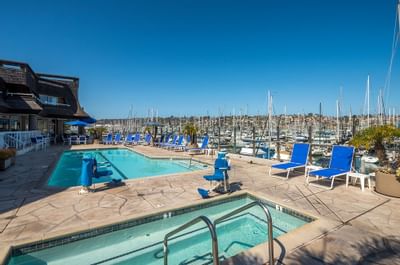 Outdoor pool and Hot tub with a gorgeous view at Bay Club Hotel