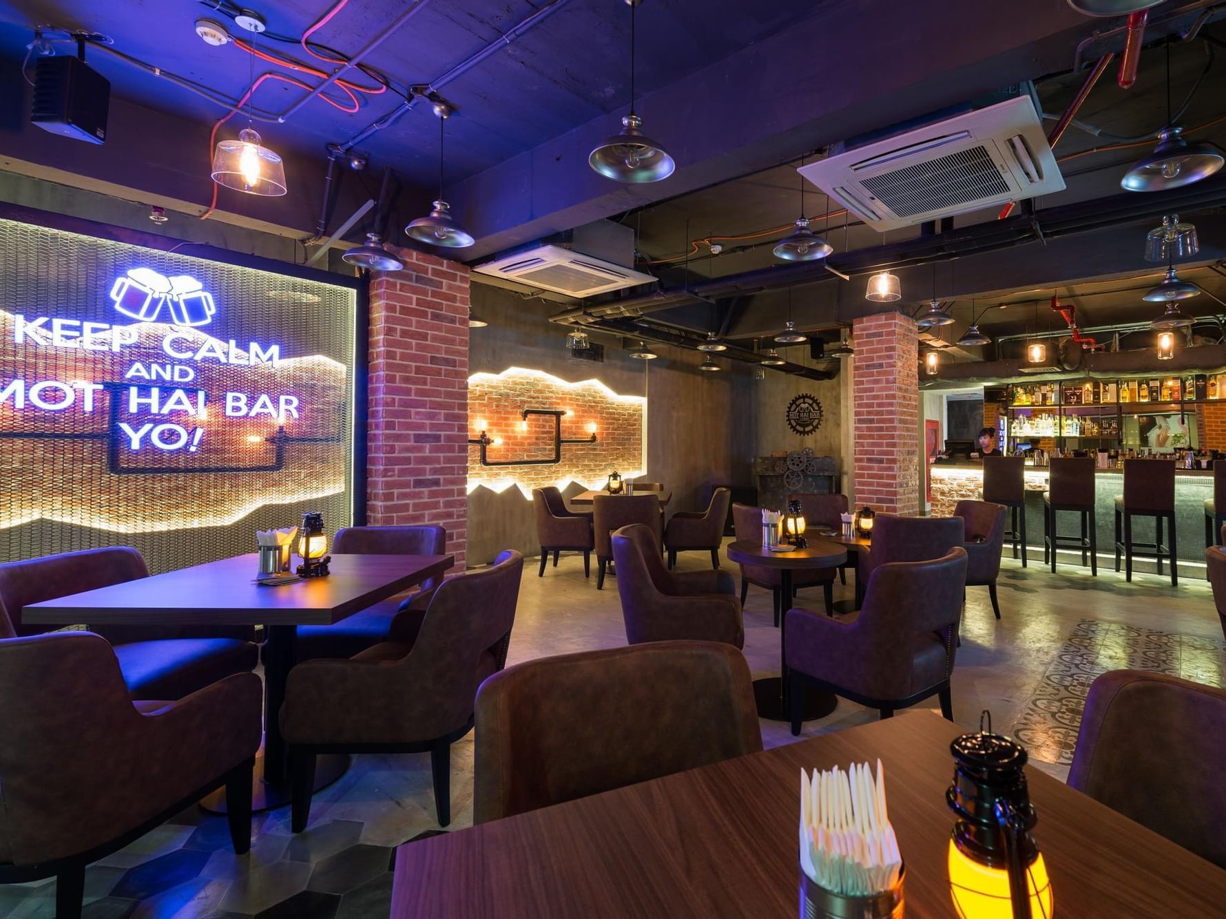 Dining area arranged in Mot Hai Bar at Eastin Grand Hotel Saigon