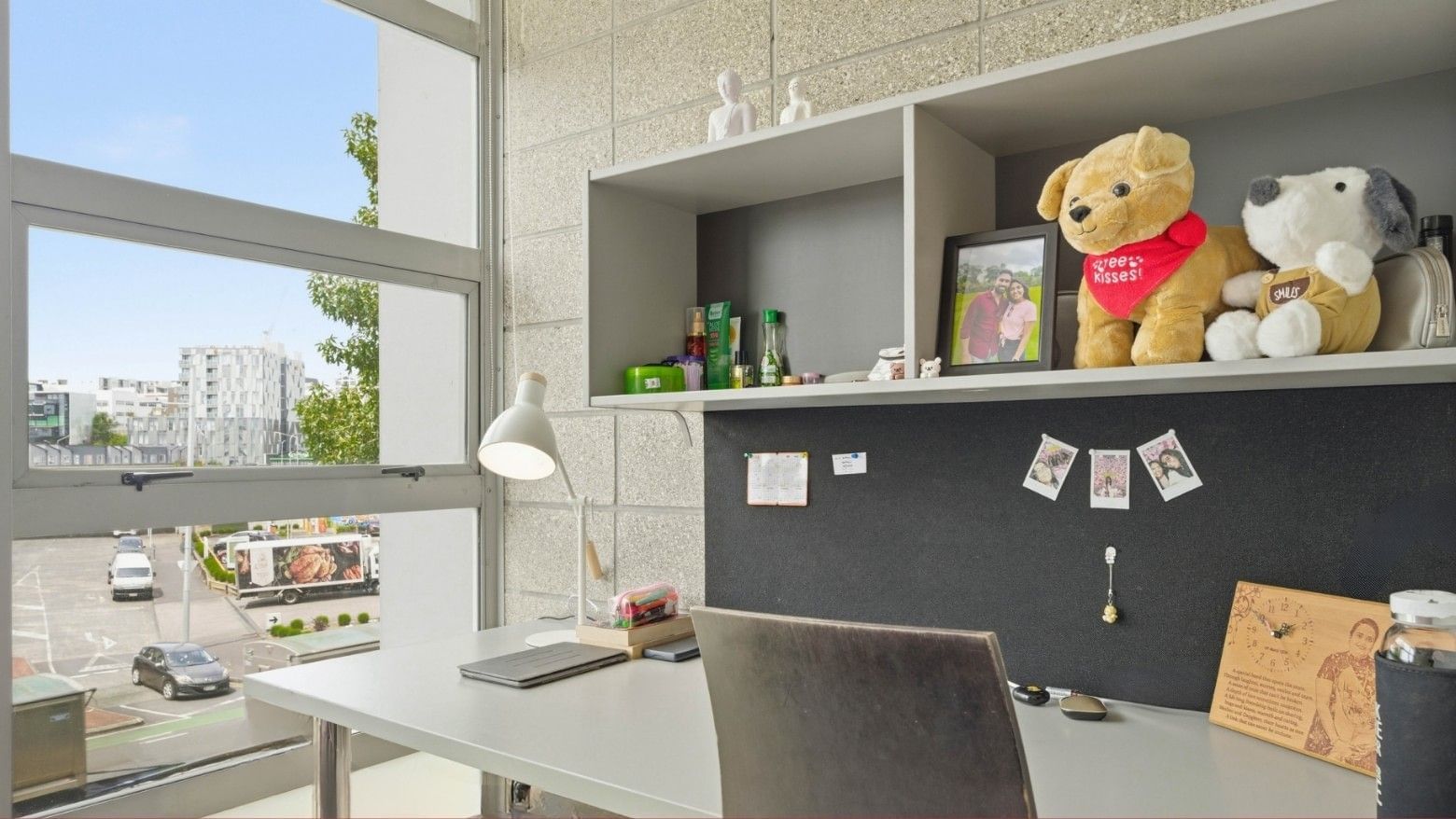 A well-organized study area with personal touches at Student Living Auckland - Beach.